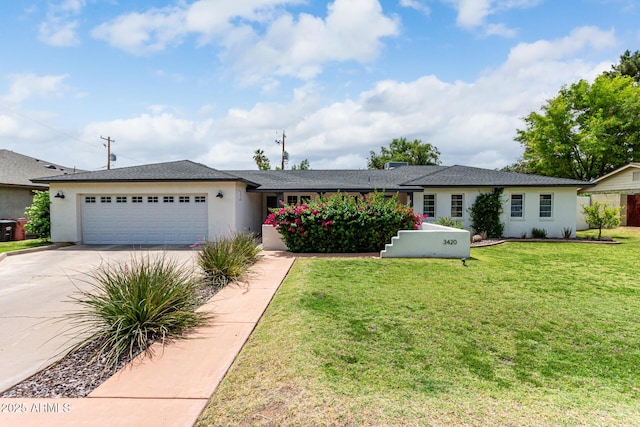 3420 N Kachina Ln, Scottsdale, AZ 85251 - ranch-style home featuring concrete driveway, an attached garage, and stucco siding