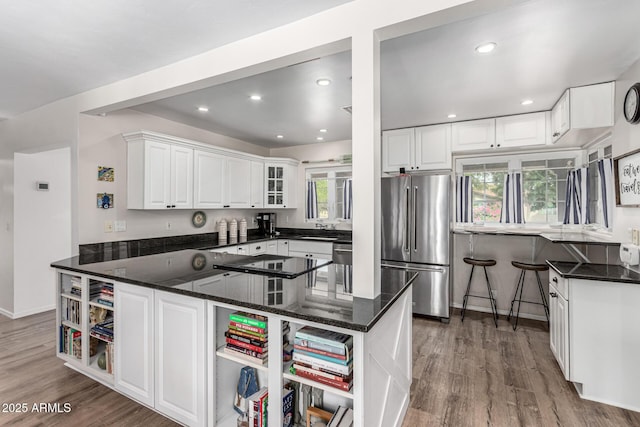 3420 N Kachina Ln, Scottsdale, AZ 85251 - kitchen with appliances with stainless steel finishes, open shelves, white cabinets, healthy amount of natural light, and recessed lighting