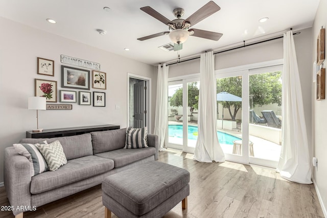 3420 N Kachina Ln, Scottsdale, AZ 85251 - living room with light wood-style floors, ceiling fan, and recessed lighting