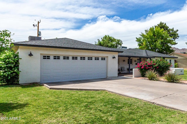 3420 N Kachina Ln, Scottsdale, AZ 85251 - ranch-style house featuring concrete driveway, stucco siding, a front yard, a shingled roof, and an attached garage