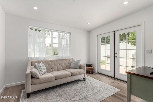 3420 N Kachina Ln, Scottsdale, AZ 85251 - living room featuring french doors, light wood-type flooring, recessed lighting, and baseboards