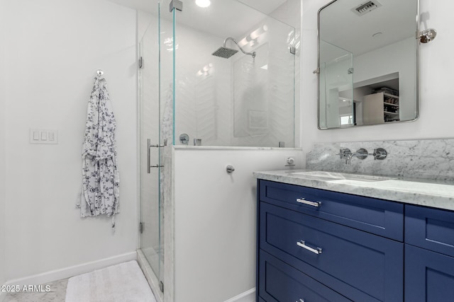 3420 N Kachina Ln, Scottsdale, AZ 85251 - full bath featuring vanity, a stall shower, and baseboards