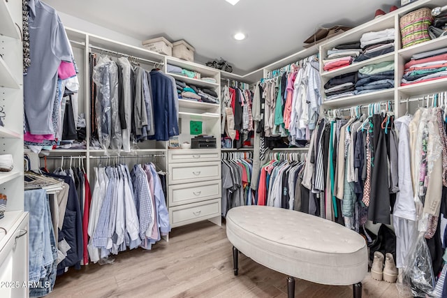 3420 N Kachina Ln, Scottsdale, AZ 85251 - spacious closet with light wood finished floors