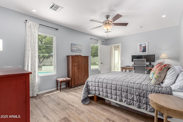 3420 N Kachina Ln, Scottsdale, AZ 85251 - bedroom featuring multiple windows, light wood-style flooring, baseboards, a ceiling fan, and recessed lighting
