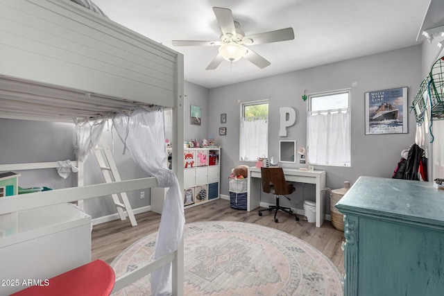 3420 N Kachina Ln, Scottsdale, AZ 85251 - bedroom featuring light wood-type flooring, ceiling fan, and baseboards