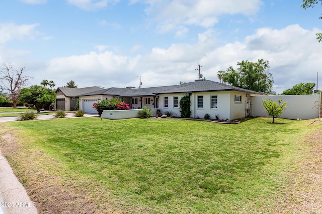 3420 N Kachina Ln, Scottsdale, AZ 85251 - ranch-style house featuring concrete driveway, a garage, a front lawn, and stucco siding
