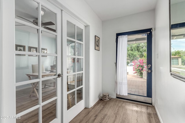 3420 N Kachina Ln, Scottsdale, AZ 85251 - doorway with french doors, wood finished floors, and baseboards