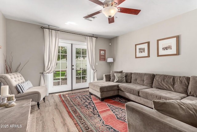 3420 N Kachina Ln, Scottsdale, AZ 85251 - living area with french doors, wood finished floors, and ceiling fan