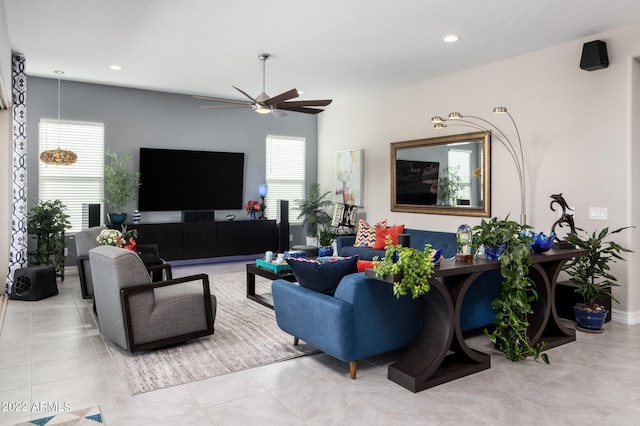 living room with light tile patterned floors and ceiling fan