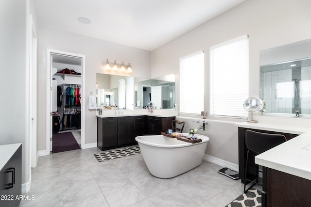 bathroom with vanity and plus walk in shower