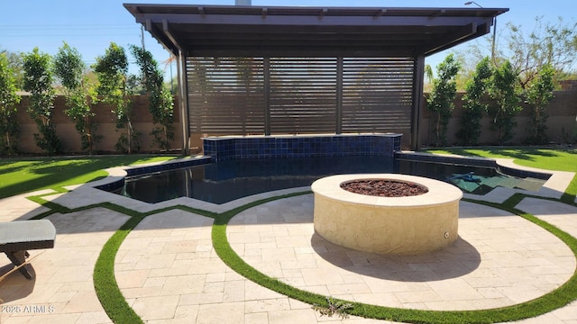 view of patio / terrace featuring a fire pit