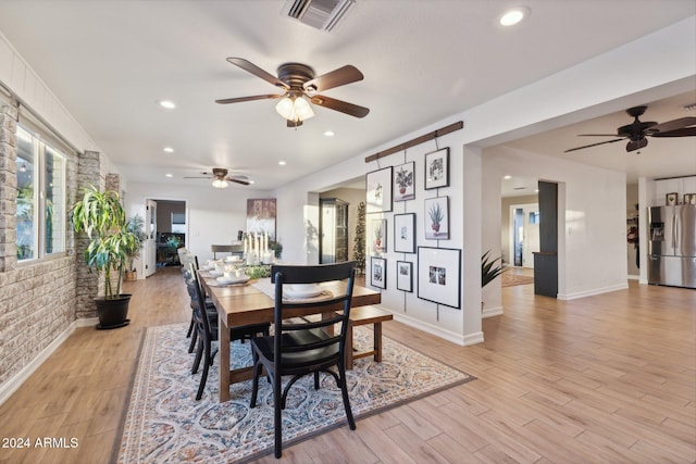 dining space featuring light hardwood / wood-style flooring