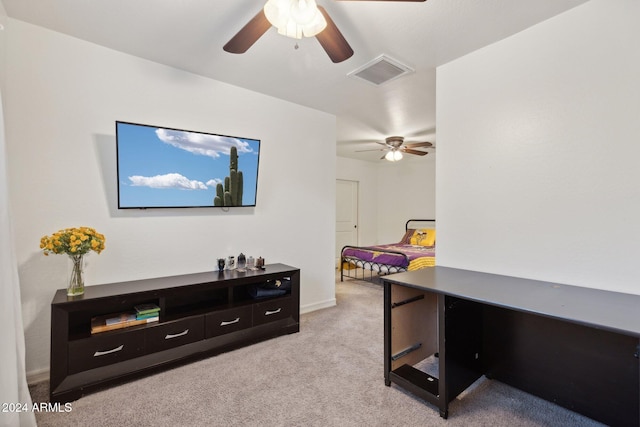 office featuring ceiling fan and light colored carpet