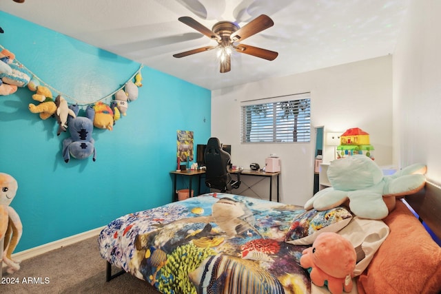 bedroom with ceiling fan and carpet