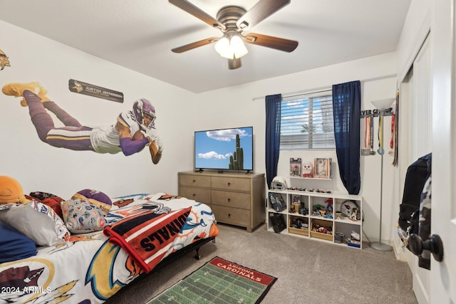 bedroom featuring ceiling fan and carpet flooring