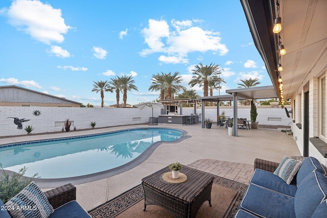 view of pool with outdoor lounge area, a pergola, a water view, and a patio