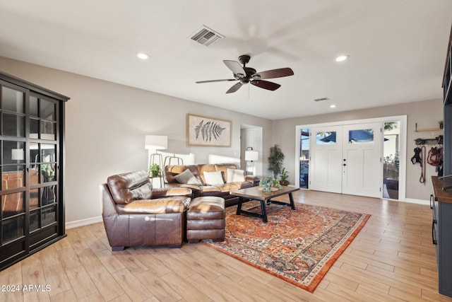 living room featuring ceiling fan