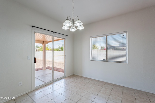 14244 N 132nd Ln, Surprise, AZ 85379 - unfurnished room featuring baseboards, an inviting chandelier, and light tile patterned flooring