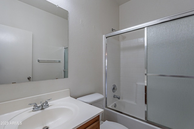 14244 N 132nd Ln, Surprise, AZ 85379 - full bath featuring toilet, vanity, and combined bath / shower with glass door