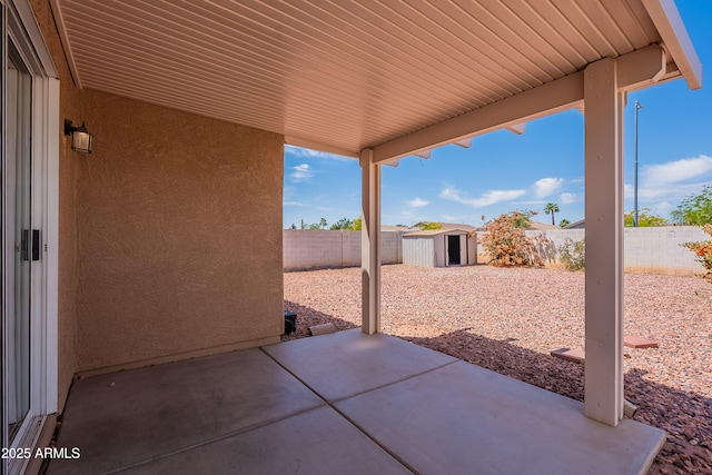 14244 N 132nd Ln, Surprise, AZ 85379 - view of patio / terrace featuring a storage shed, an outdoor structure, and a fenced backyard