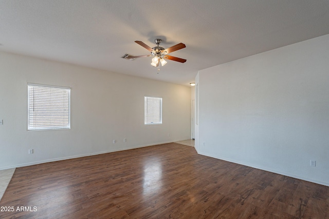 14244 N 132nd Ln, Surprise, AZ 85379 - unfurnished room with visible vents, wood finished floors, and ceiling fan
