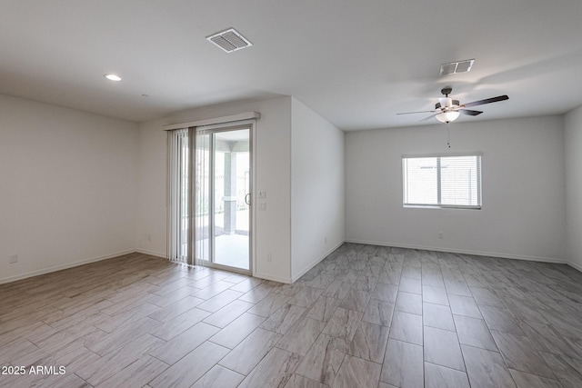 unfurnished room featuring ceiling fan