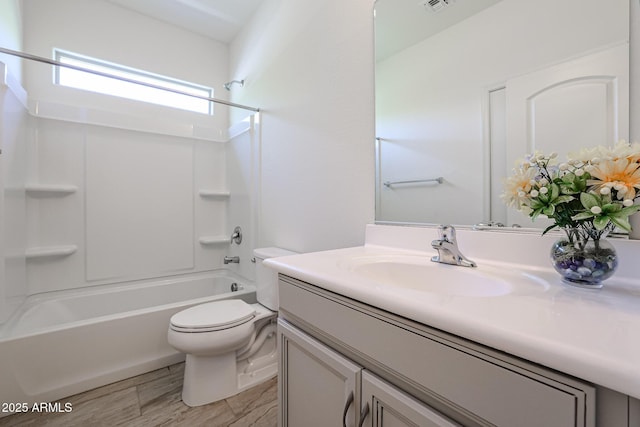 full bathroom featuring vanity, toilet, and shower / bathtub combination