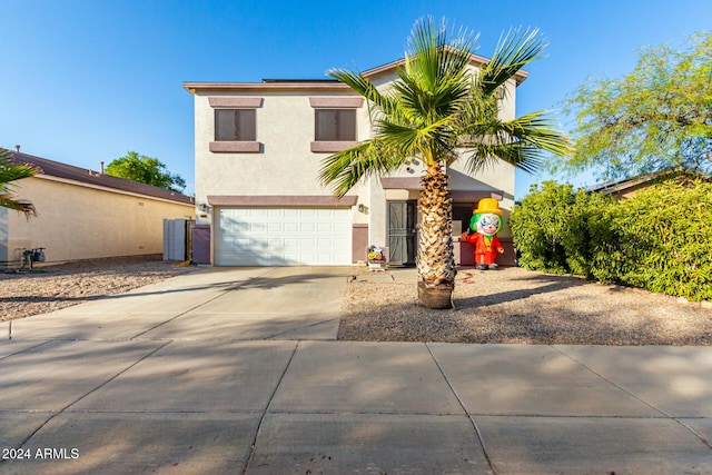 view of front of property featuring a garage