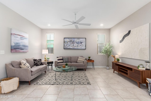 living room featuring recessed lighting, ceiling fan, baseboards, and light tile patterned floors