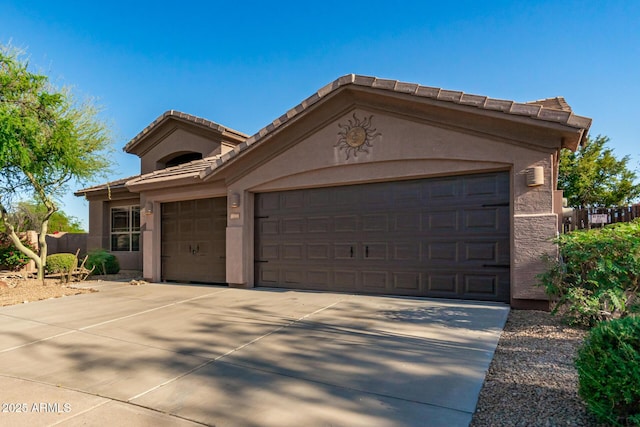 11540 S Morningside Dr, Goodyear, AZ 85338 - single story home with concrete driveway, stucco siding, a garage, and a tile roof