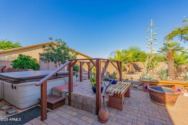 11540 S Morningside Dr, Goodyear, AZ 85338 - view of patio / terrace featuring a fenced backyard and a hot tub