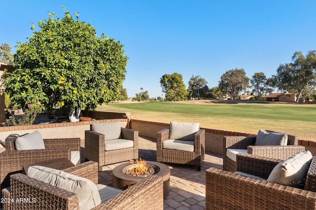 view of patio featuring an outdoor fire pit