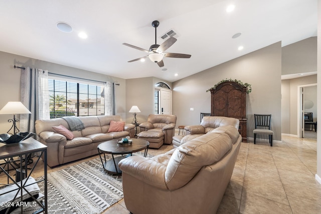 tiled living room featuring ceiling fan