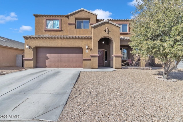 1923 N Cocoa Ct, Casa Grande, AZ 85122 - view of front of home with a garage, concrete driveway, stucco siding, and a tile roof