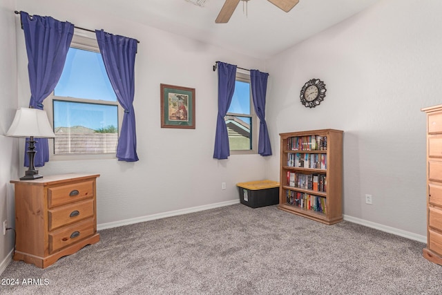 miscellaneous room with carpet flooring and ceiling fan