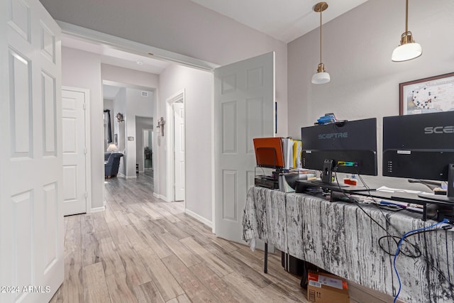 office with wood-type flooring