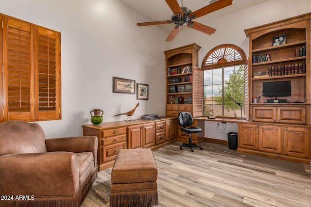 office area featuring ceiling fan, light hardwood / wood-style flooring, and built in desk