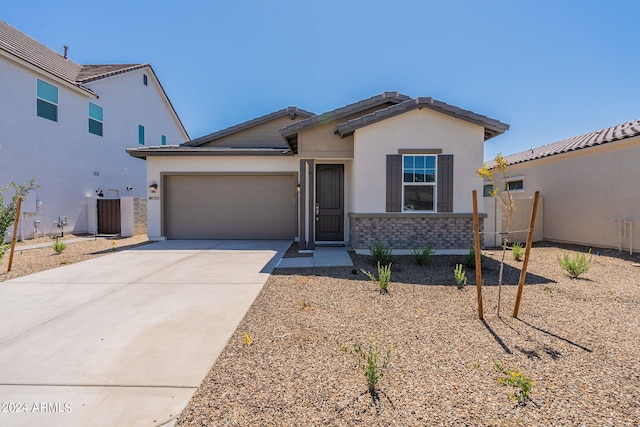 view of front of property with a garage