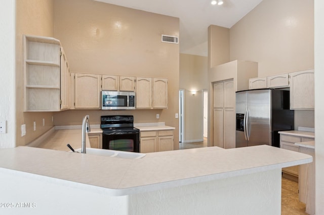 5010 W Ivanhoe St, Chandler, AZ 85226 - kitchen featuring appliances with stainless steel finishes, high vaulted ceiling, light countertops, a peninsula, and a sink