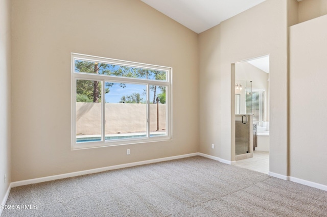 5010 W Ivanhoe St, Chandler, AZ 85226 - unfurnished room featuring carpet, healthy amount of natural light, lofted ceiling, and baseboards