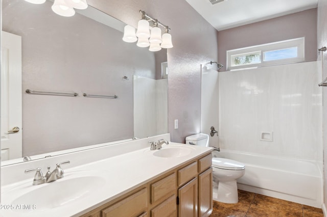 5010 W Ivanhoe St, Chandler, AZ 85226 - bathroom with toilet, bathing tub / shower combination, tile patterned floors, and double vanity