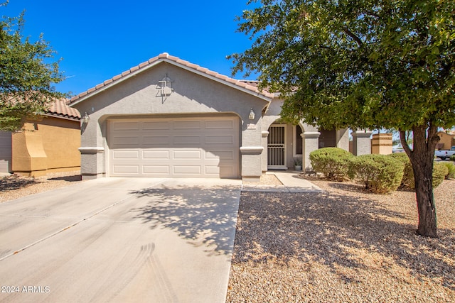 view of front of property with a garage