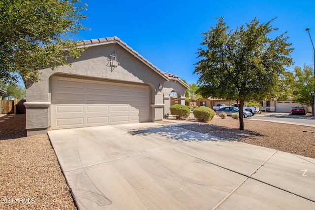 view of front of property with a garage