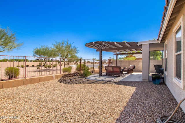 view of yard with a pergola and a patio area