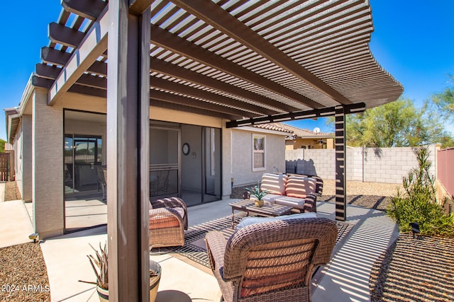 view of patio with a pergola and an outdoor living space