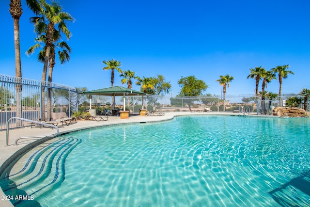 view of pool with a gazebo and a patio