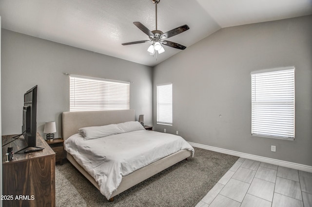 12543 W Roanoke Ave, Avondale, AZ 85392 - bedroom featuring vaulted ceiling, baseboards, and ceiling fan