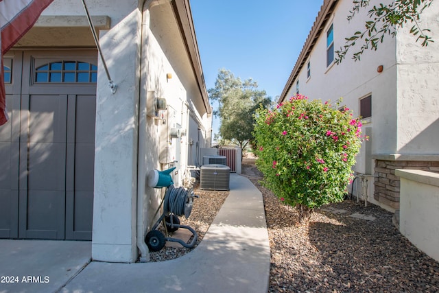 view of side of property with cooling unit