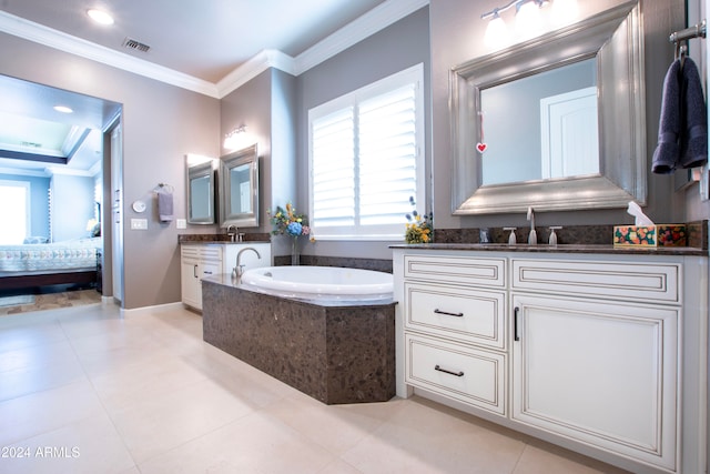 bathroom featuring vanity, crown molding, tile patterned floors, and tiled tub