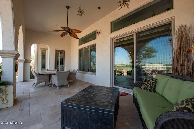 view of patio featuring outdoor lounge area and ceiling fan